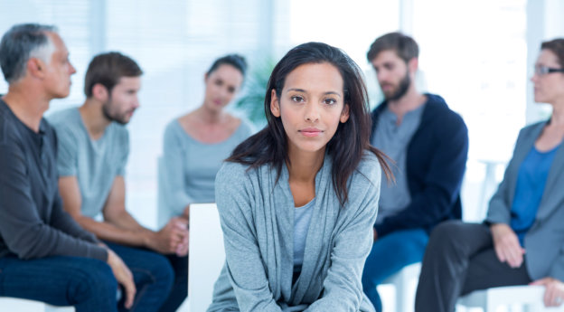 woman in a group therapy session