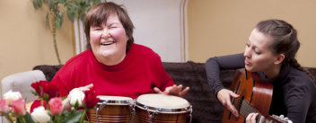 two women make a music therapy